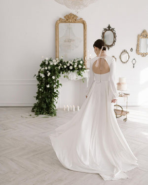 Open back wedding dress. Long sleeve white dress for bride. A-line wedding dress. Bridal shopping online.