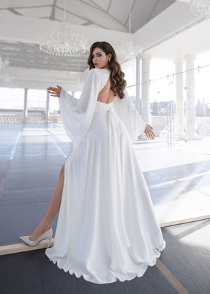 Long sleeve wedding dress online. Silk dresses for brides. Bridal silk dress. Long sleeve bridal dress online. Simple white dress. Open back wedding dress. Sexy wedding dress online.