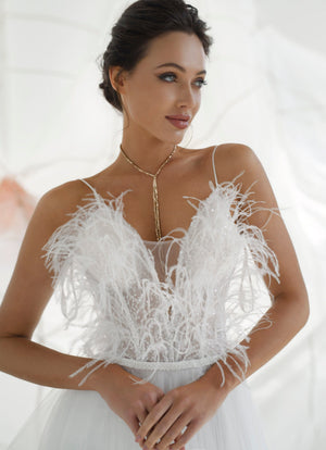 A-line wedding dress with feathers. Glamorous weddin dress online.